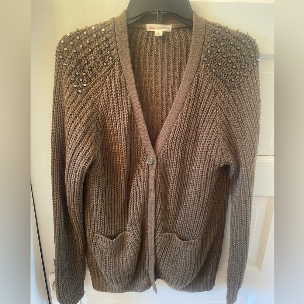 Brownish green cardigan sweater with studded accent on shoulders